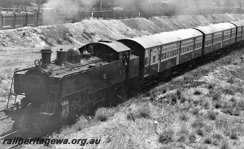 P22221
DM class 582, on suburban passenger train including AYB class first class brake saloon and AY class second class saloon, East Perth, ER line, front and side view 
