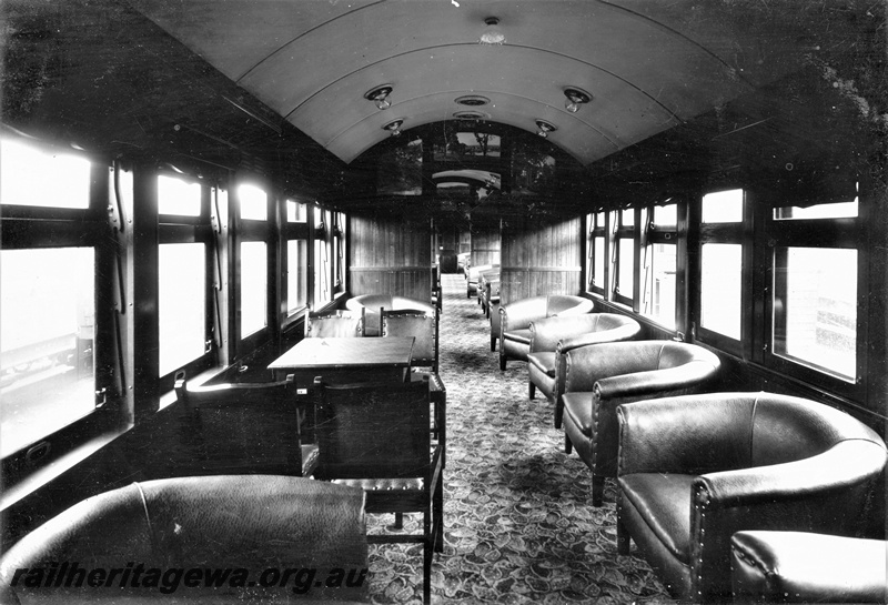 P22226
Interior view of AYL class lounge car, showing compartment with table and chairs, and lounge chairs
