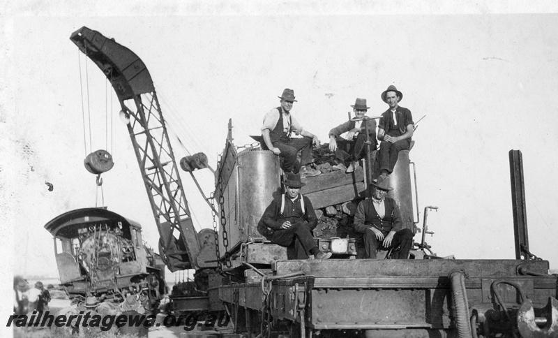 P22262
Derailment at 169 mile near Bruce Rock YB line No 5 of 7, Cravens 25 ton breakdown crane No.23, workers on board, L class 240, rear view of loco

