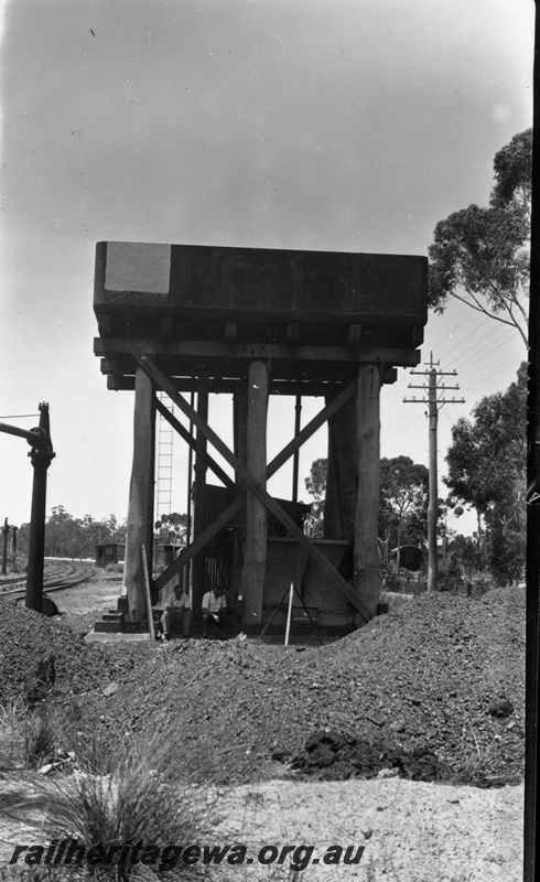 P22346
Views of Koojedda 2 of 3, water tower, water cranes, station building, platform, Koojedda, ER line, view from ground level 
