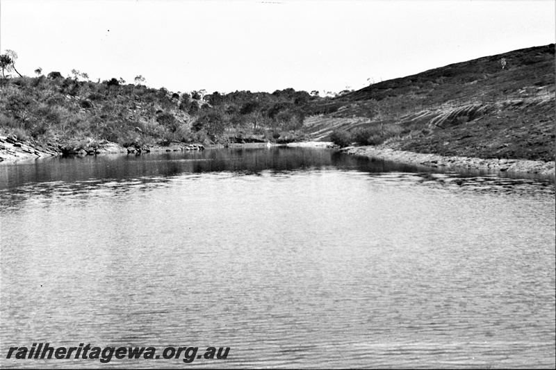 P22356
Railway dam, surrounding hillside, Muntadgin, NKM line, water view
