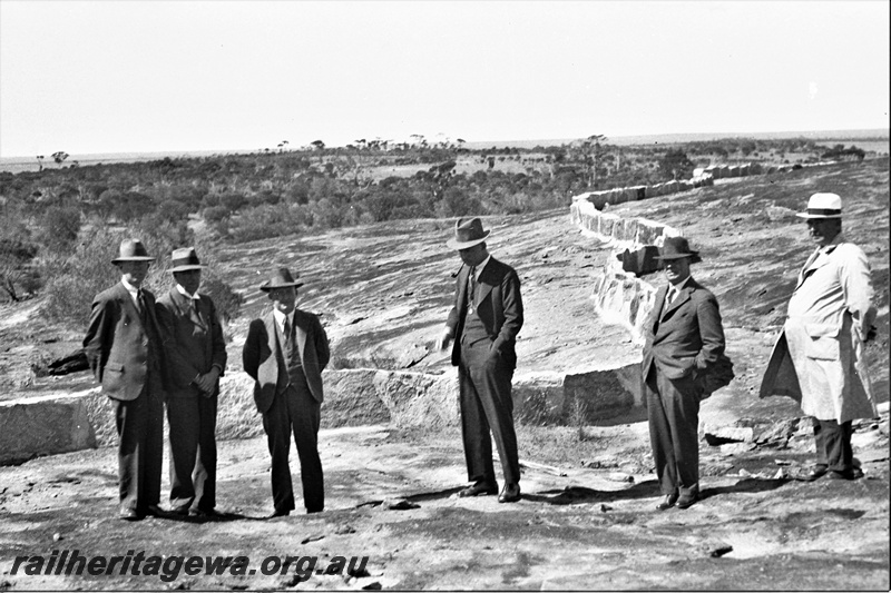 P22358
Group of railway officials, stone wall, at railway dam, Muntadgin, NKM line
