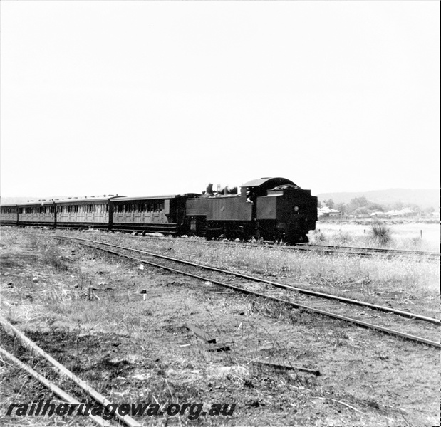 P22373
DM class loco, tender first, on passenger train of AD class carriages, Gosnells, SWR line, side and end view
