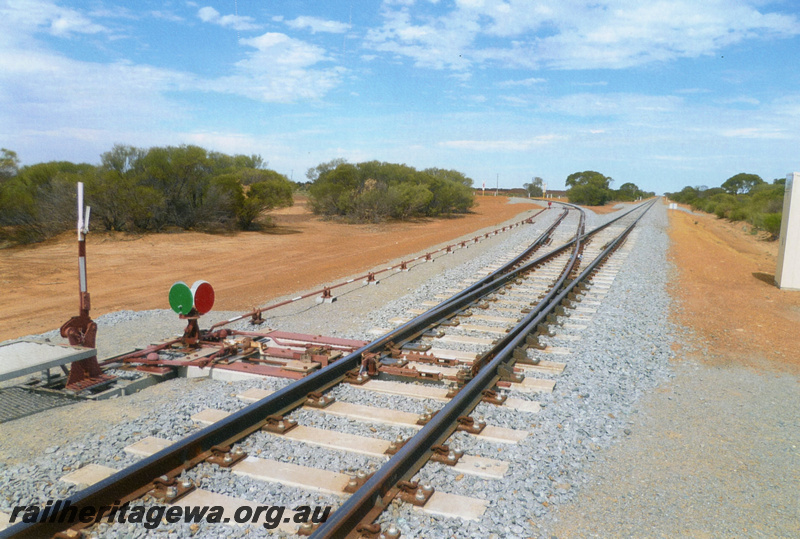 P22409
Points, point lever and signal, siding to loadout loop, Tilley, EM line, trackside view
