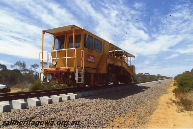 P22411
John Holland track machine TM 722, west of Tenindewa, NR line, end and side view
