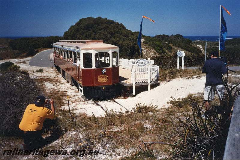 P22417
Rottnest Island Oliver Hill Railway railcar, platform, onlookers, Oliver Hill station, Rottnest Island, side and end view
