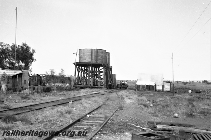 P22426
Water towers, siding, trackside buildings, Shaw River, PM line, track level view
