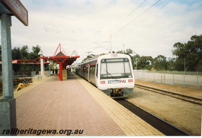 P22451
Fastrak EMU A series including power car AEA class 210, at station, platform, canopy, passengers, Armadale, SWR line, side and end view
