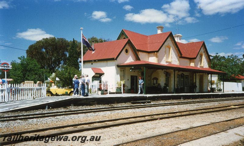 P22455
Station building, platform, canopy, station sign, flagpole, pedestrians, tracks, York, GSR line, view from track level
