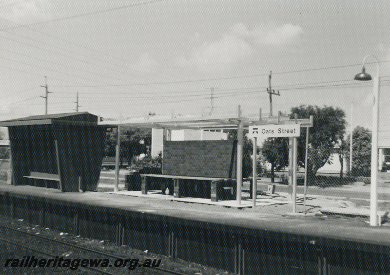 P22476
Oats Street station SWR line 4 of 5, platform, shelters, station sign, station light, view from opposite platform, c1976-1977
