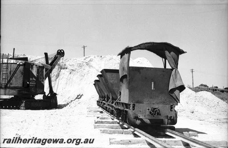 P22493
Australian Railway Historical Society Western Australian Division tour to Maylands brickworks 16 of 16, loco no 1, wagons, tracks, mechanical shovel, piles of earth, side and front view
