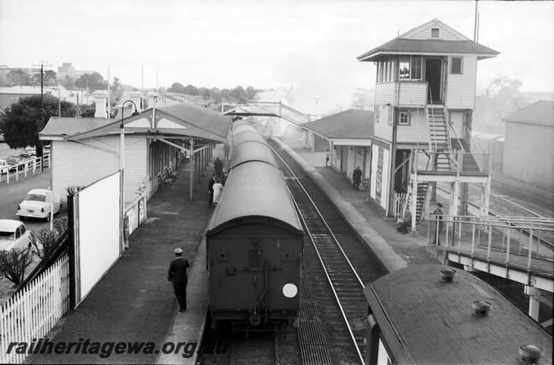 P22606
Subiaco Station showing signal box and island platform with good shed. Royal show train in main platform. ER line. 
