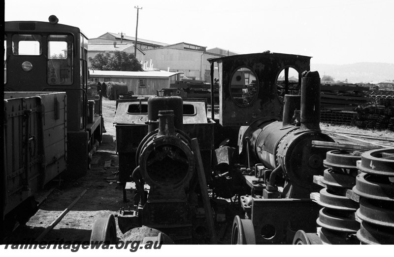 P22620
2ft gauge Krauss 0-4-0WT (b/n 2181 of 1889) on right, 5th oldest steam locomotive in Australia, derelict condition, ex-MRWA E Class 30 on left, middle locomotive unidentified, Midland Workshops
