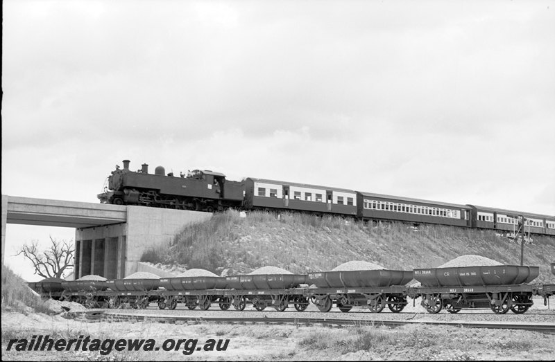 P22629
DD class 594 hauling a Royal Show passenger train from Armadale crossing Kenwick Flyover  with Standard Gauge ballast train in foreground. SWR line. 
