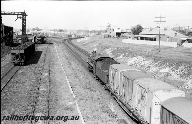 P22648
PMR hauls an up goods past East Perth loco. ER line.
