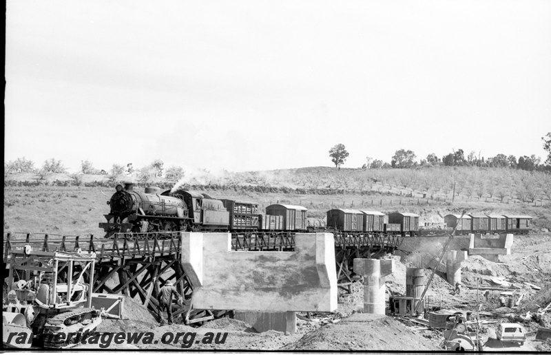 P22649
W class 952 hauls No 31 goods over the Balingup trestle bridge. Construction of new concrete bridge in foeground. PP line. 
