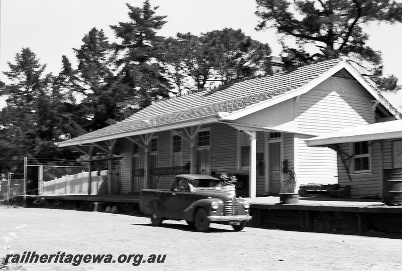 P22654
Kalamunda railway station. Austin Ute in foreground. UDRR line. 
