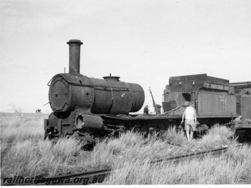 P22746
G class 32, incomplete and in state of disrepair, Port Hedland, PM line, front and side view, c1950s
