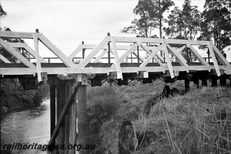 P22947
Timber truss bridge over the Harvey River, Harvey, SWR line, side view.
