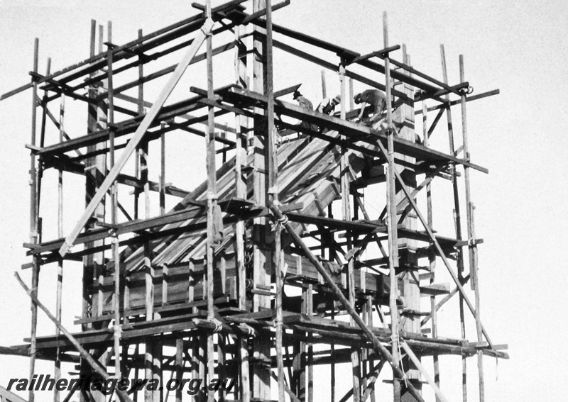 P23661
Coal stage under construction, 1 of 4, scaffolding, workers, Caron, MR line, view of part of structure  from ground level
