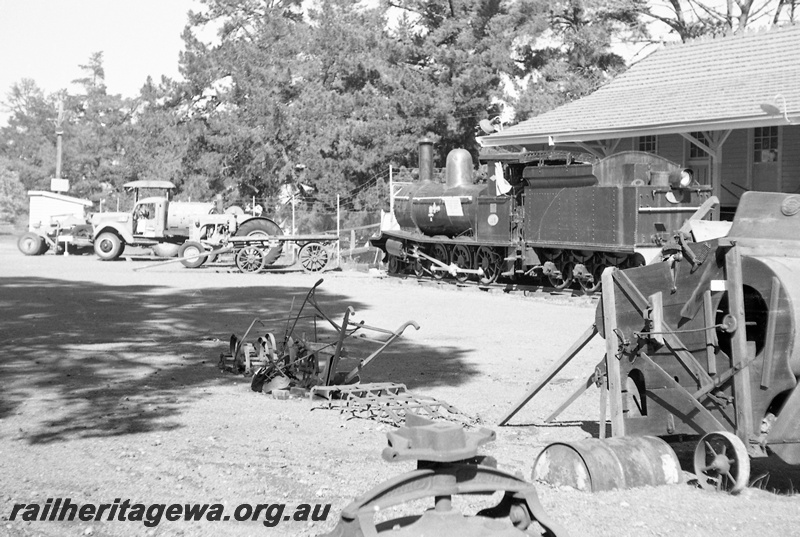 P23955
G class 118, station building, other exhibits including truck and wagon, Kalamunda History Village, side and rear view
