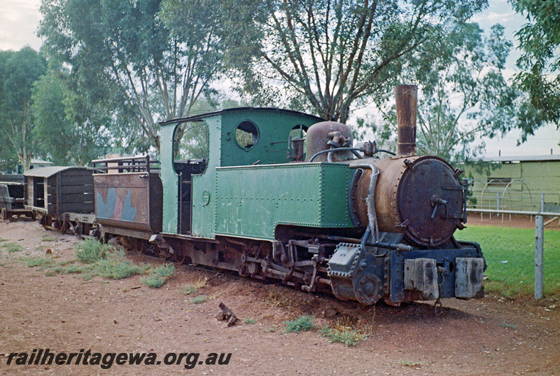 P24144
Former Sons of Gwalia goldmine firewood tank locomotive, 508mm gauge, 0-6-2T, in park at Leonora, originally built at WAGR Midland workshops, KL line, side and front view
