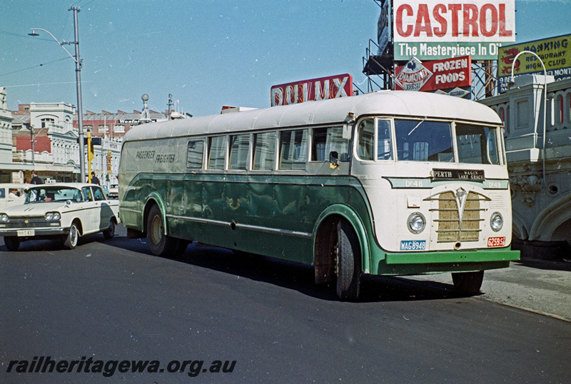 P24196
Railway Road Service  passenger freighter bus, DP48 WAG8948, on Perth to Wagin and Lake Grace route, near Horseshoe bridge, Perth station, side and front view
