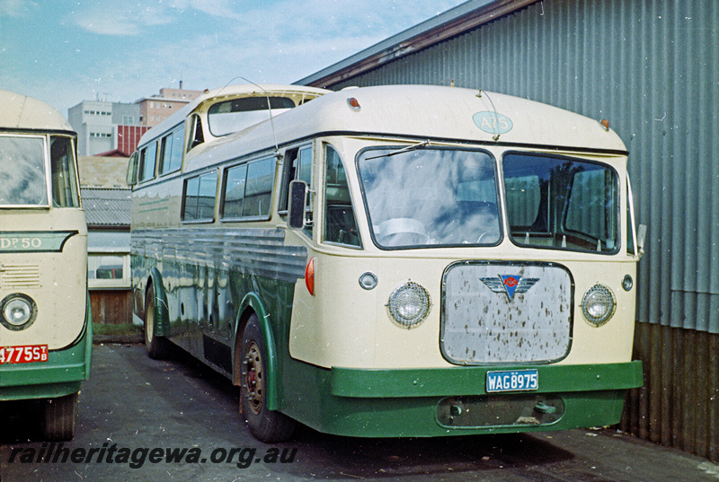 P24202
Railway Road Service  bus with viewing deck A75 WAG8975, portion of bus DP50, bus depot, Perth, side and front view
