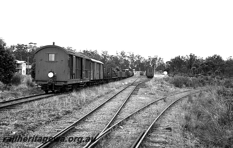P24234
Yard, tracks, rear view of goods train, wagon, vans, tracks, Pemberton, PP line, view from trackside
