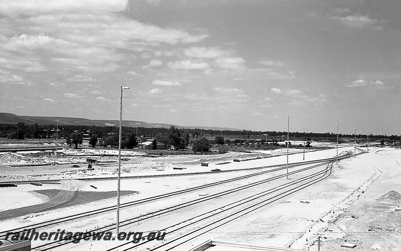 P24255
View of future hump yard site, tracks, sidings, Forrestfield, elevated view from tower
