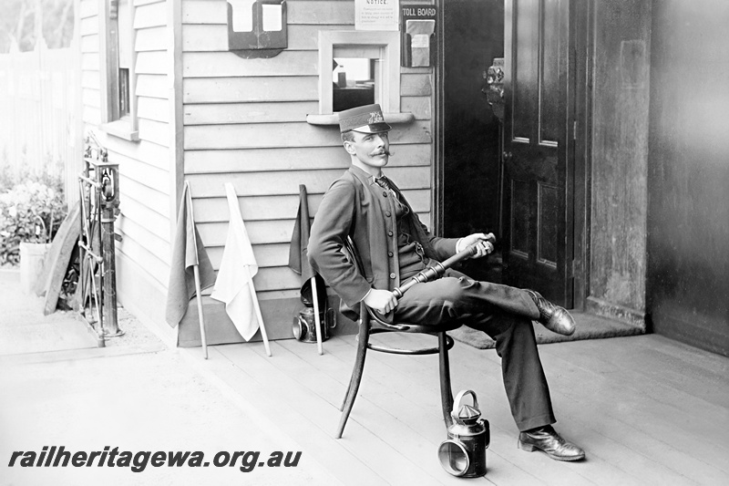 P24296
Frederic S. Barnett, in full railway officer's uniform,sitting with staff in hand, viiew also shows portrait view, location unknown
