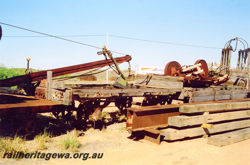 P24303
Derelict 4 wheel wagons and other junk, Carnarvon, general view of area
