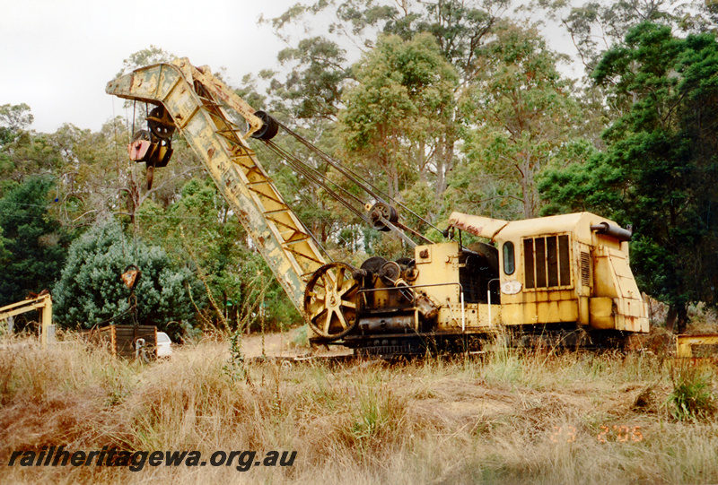 P24306
2 of 2 views of the ex WAGR breakdown crane No. 31, run down condition, side and end view
