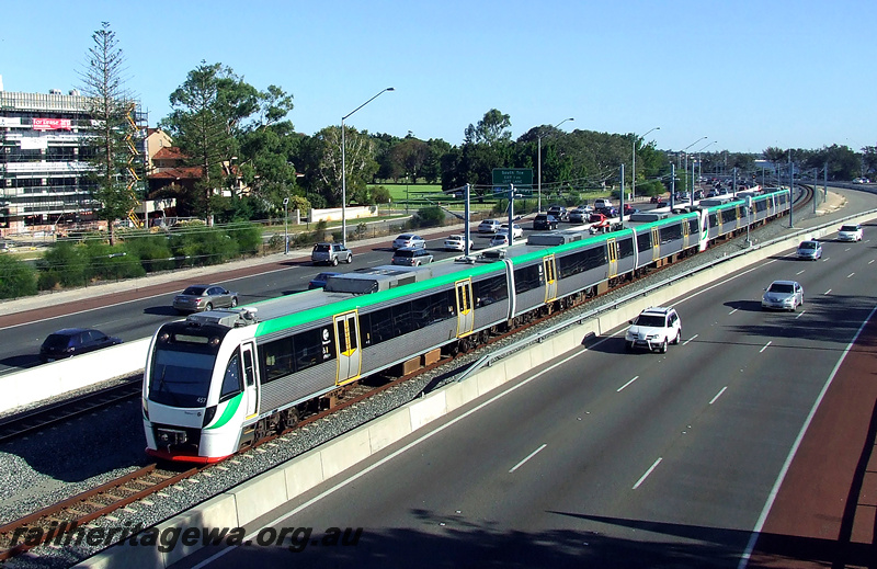 P24322
EMU set 57, comprising BEA, BEB and BET class railcars, coupled to another B series set, Kwinana freeway, South Perth, Mandurah line, end and side view
