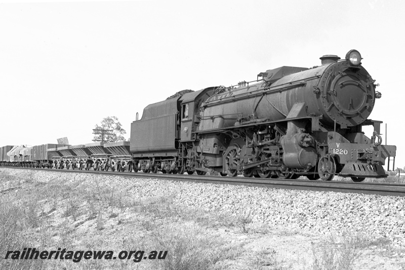 P24354
V class 1220, on No 23 goods to York including hopper wagons, past Oakover Road, ER line, side and front view 
