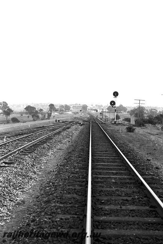 P24378
View of Goodwood loop, points, tracks, light signals, SWR line, track level view looking towards Perth
