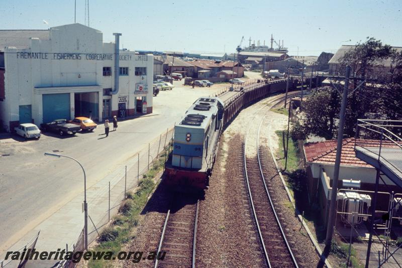 T00088
L class, Fremantle near Fisherman's Harbour, hauling empty car wagons 
