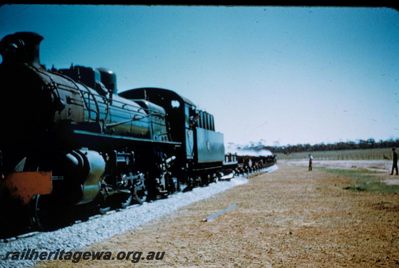 T00130
PM class, location Unknown, on ballast train
