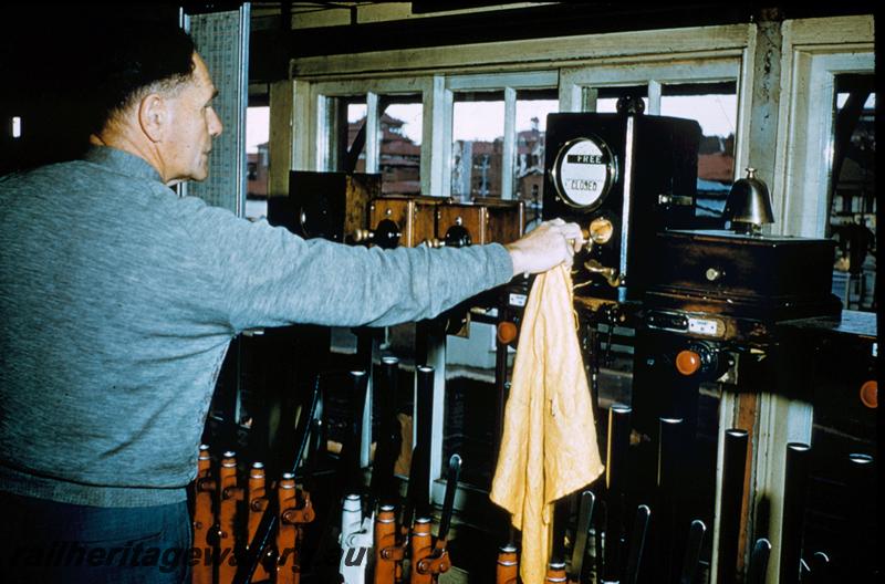 T00282
Signal box, internal view, signalman operating
