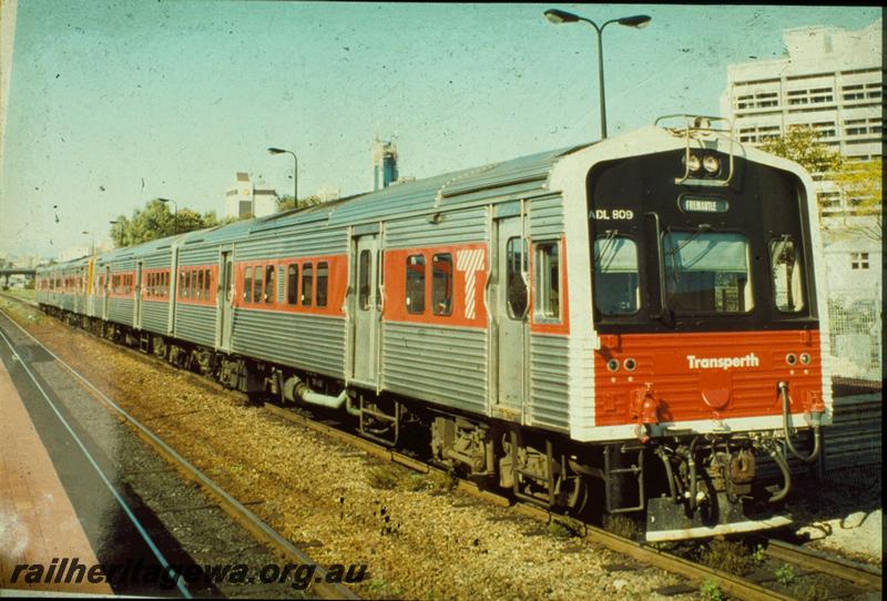 T00368
ADL class 809 railcar with red and black front and red stripe along the side, side and front view, double consist
