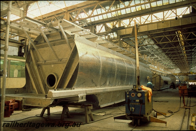 T00370
2 of 3 views of the construction of XU class wheat wagons, Boiler Shop South, Midland Workshops, final assembly
