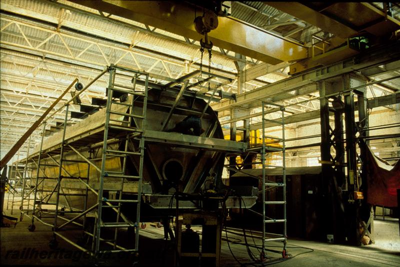 T00371
3 of 3 views of the construction of XU class wheat wagons, Boiler Shop South, Midland Workshops, final assembly
