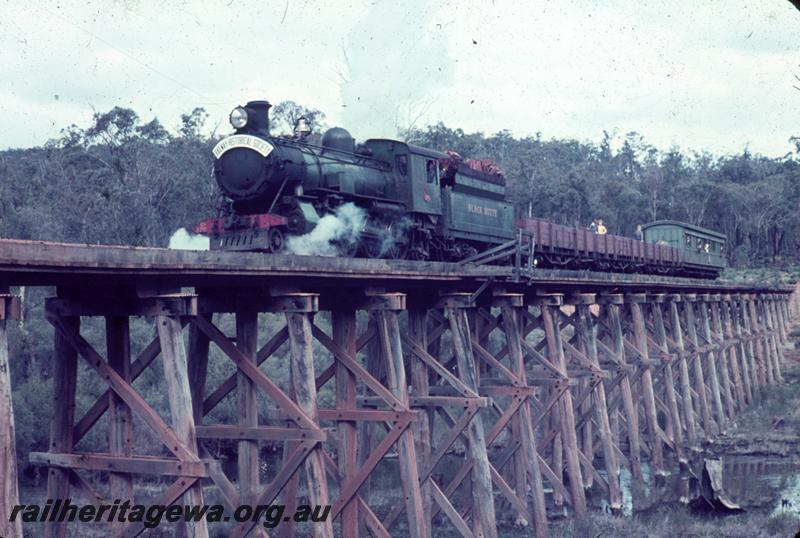 T00439
CS class 270 loco, Banksiadale line, hauling tour train with open wagon and a carriage on the trestle bridge at Asquith
