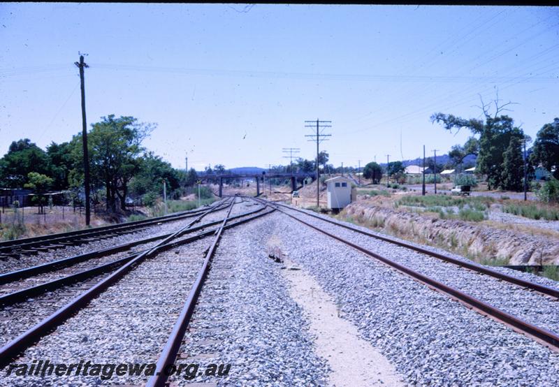 T00754
Track work, relay cabin, overpass, start of dual gauge deviation, old narrow gauge line on right, Bellevue
