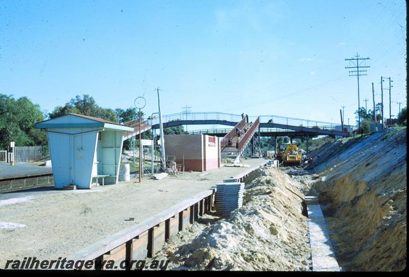 T00903
Track work, bus shelter type station structure, Success Hill, rearrangement of platforms due to the Standard Gauge construction
