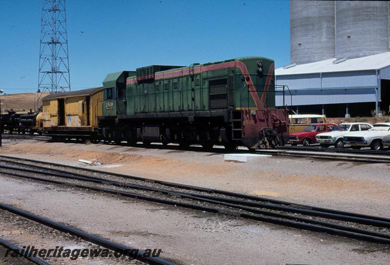 T01043
A Class 1508, green livery with red and yellow stripe, with Z Class brakevan, Avon Yard
