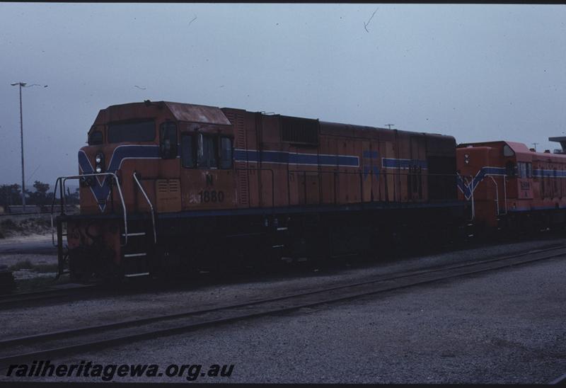 T01301
N class 1880, orange livery, front and side view
