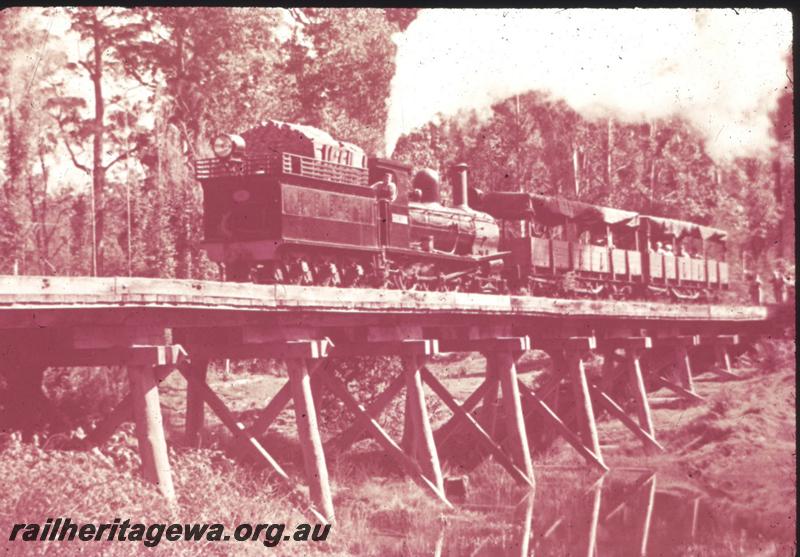 T01354
SSM G class, trestle bridge, tour train with open wagons with canopies. Same as T0597
