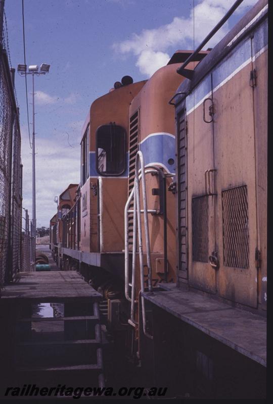 T01383
C class 1701, service area, orange livery, oblique view of cab
