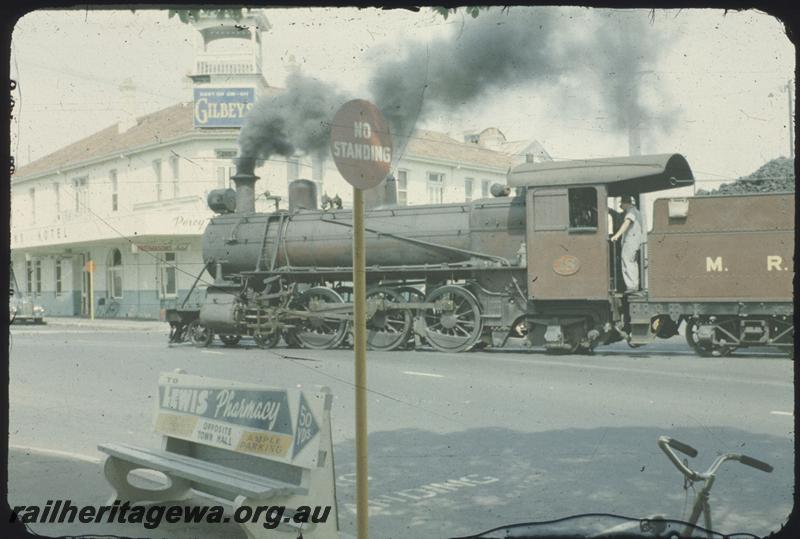 T01616
MRWA C class 18, brown livery, crossing intersection of Great Eastern Highway and Helena Street, Midland Junction.
